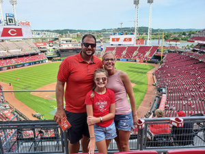 Nick Hill with wife and daughter at Cincinnati Reds games