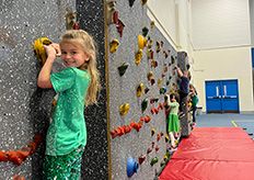 Students on a rock climbing wall